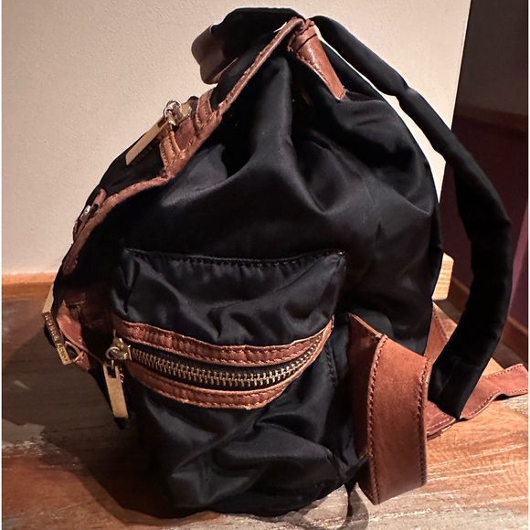 Tory Burch backpack black nylon brown leather multiple zipper and open pockets main image 10